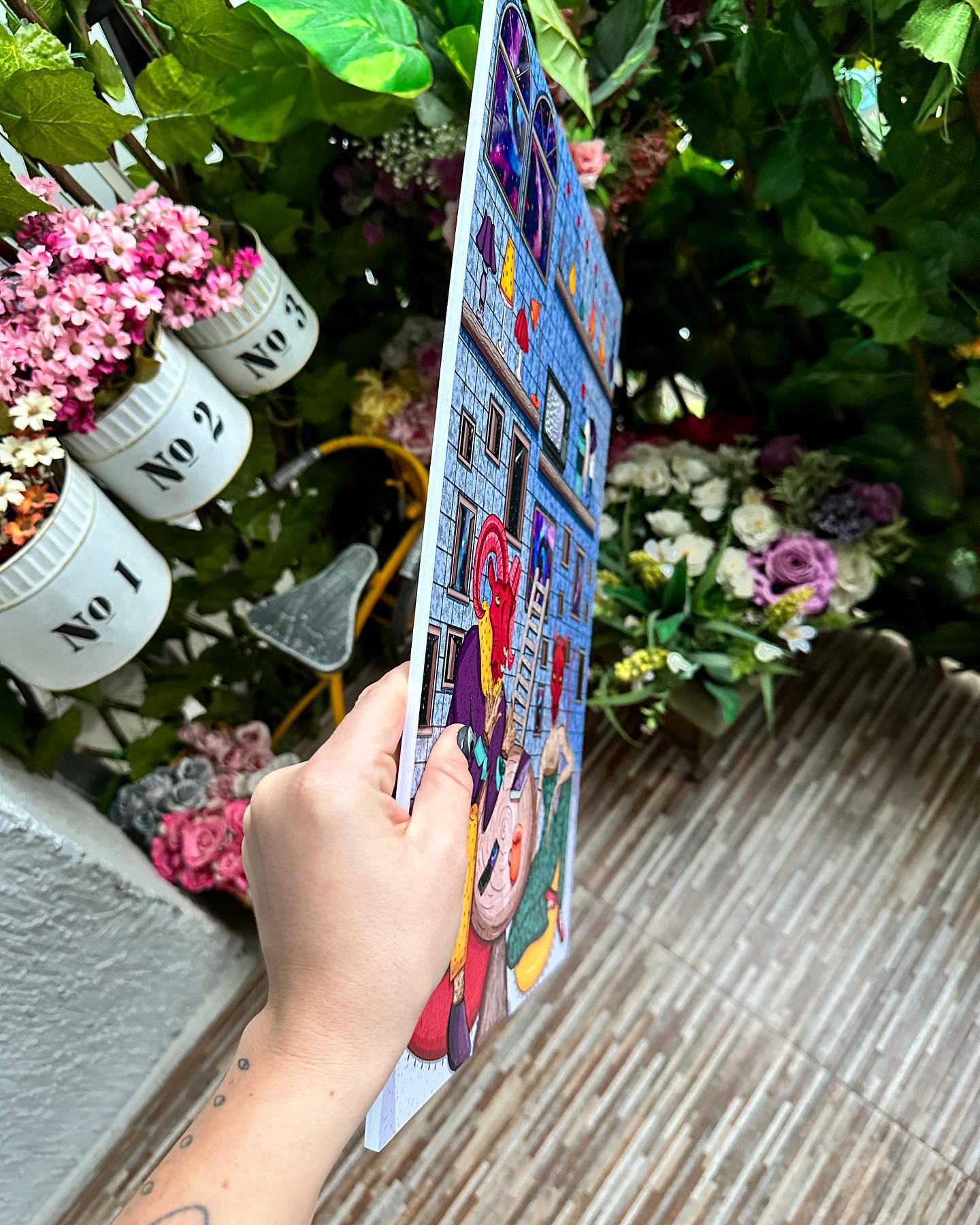 Colorful poster with cartoon illustration.