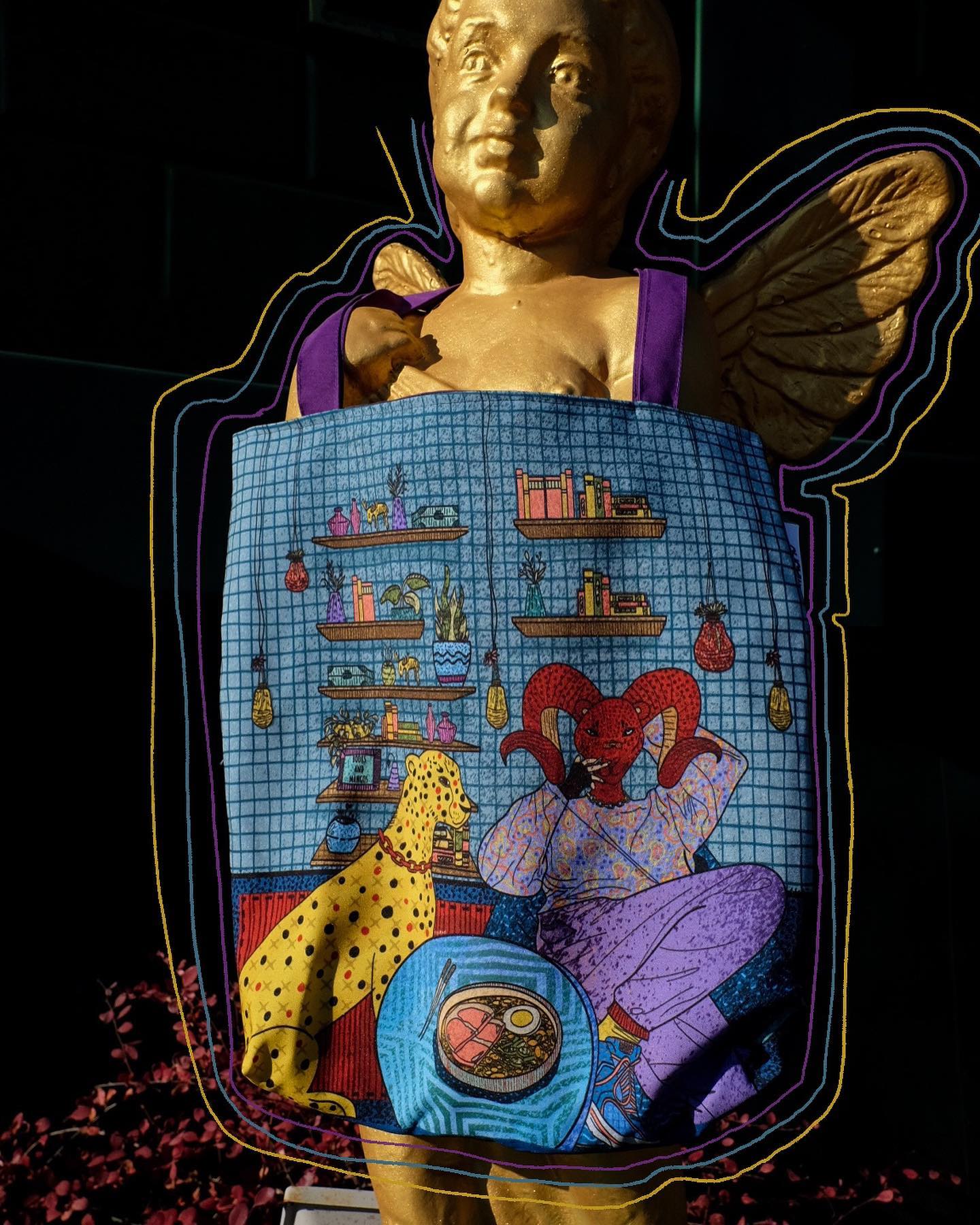 Statue of cherub with purple sash and gold wings superimposed over blue grid background with cartoon-like illustration of room with bookshelf, cat, and person wearing purple outfit holding blue record.