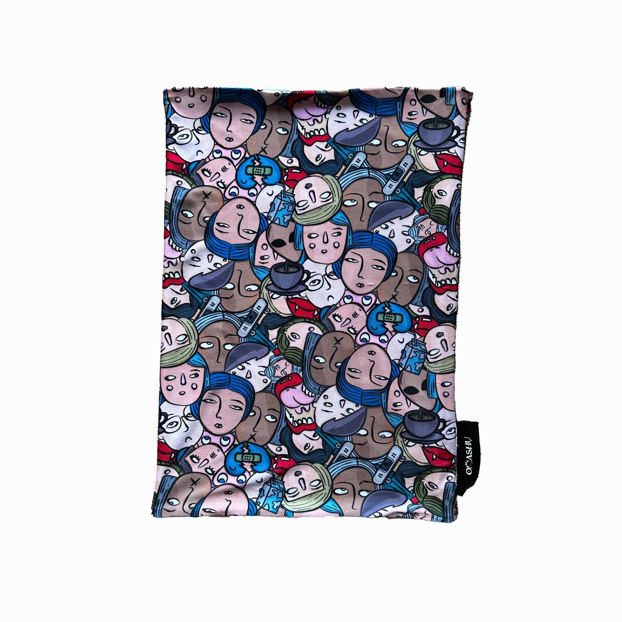 A rectangular piece of fabric with an abstract design featuring overlapping cartoon faces in various colors and expressions. The pattern is filled with busy details, showcasing a mix of emotions and character styles.