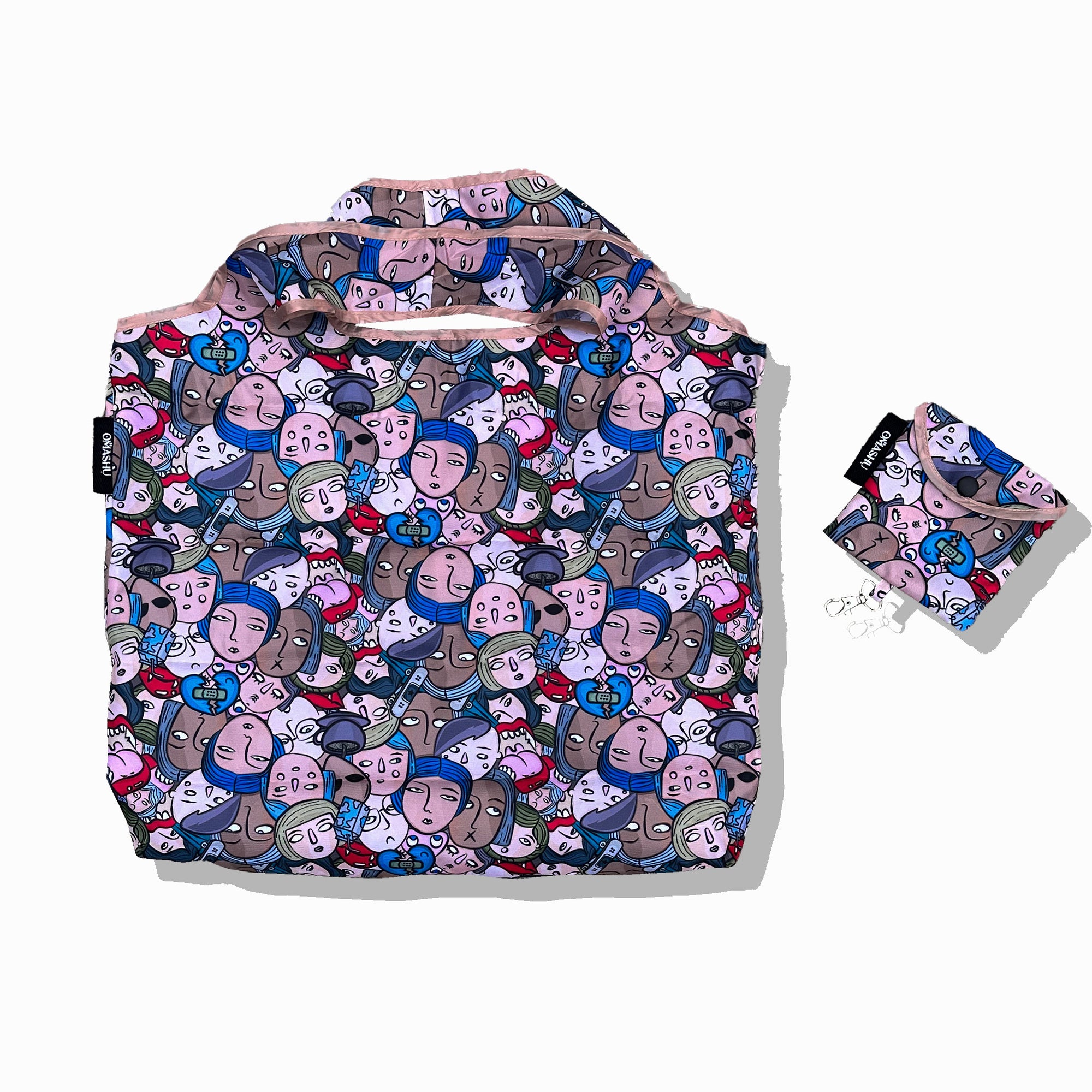 A market bag with vibrant fabric featuring cartoon characters and symbols in shades of purple, pink, and blue.