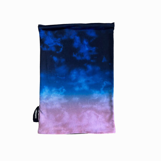 A rectangular fabric with a gradient design that transitions from deep blue at the top to light purple at the bottom. The fabric features a subtle pattern of clouds, creating a dreamy, atmospheric effect.