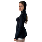 Woman wearing a black hooded top on a white background