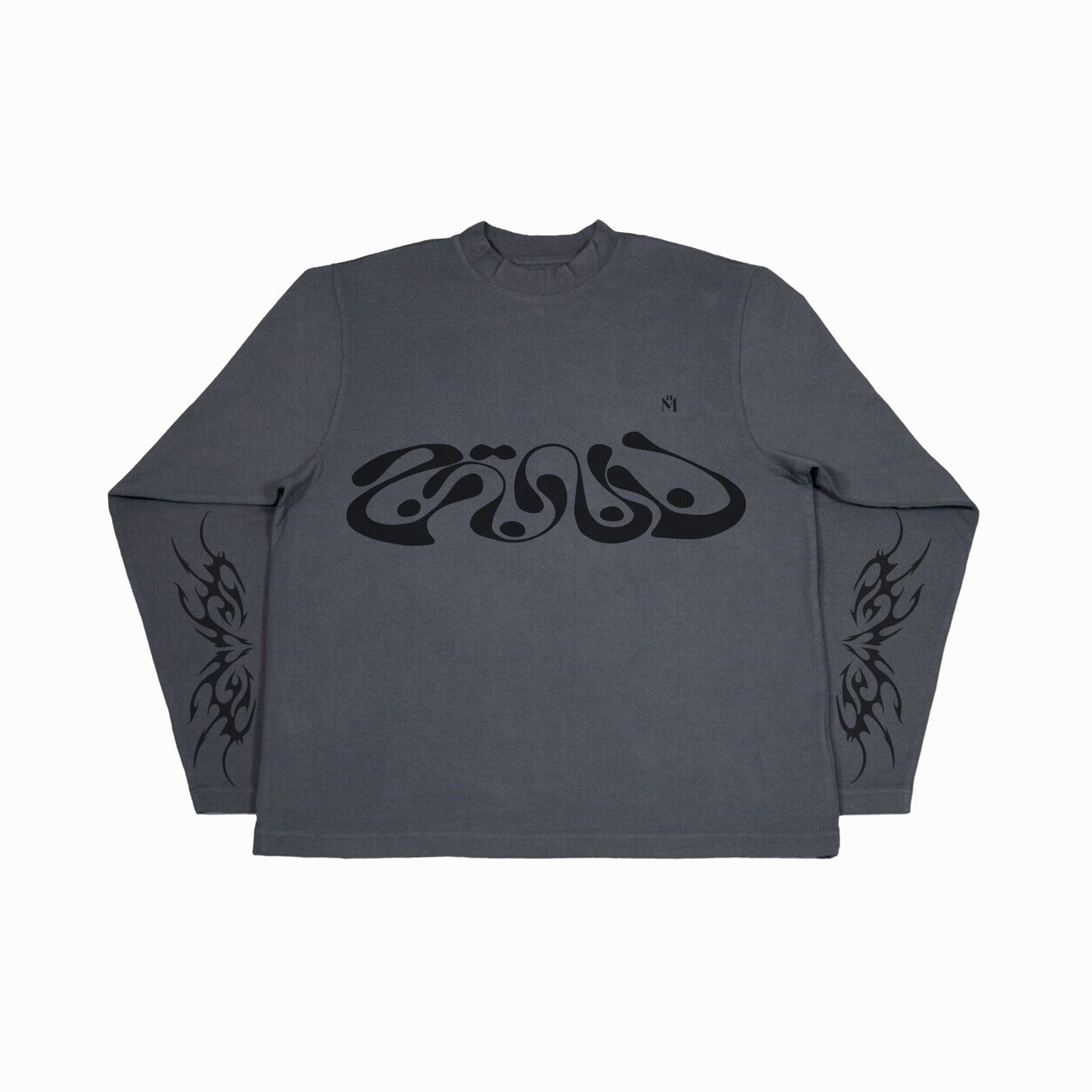 A flat lay of the same dark grey long-sleeved shirt with the swirl design on the chest and tribal pattern on the sleeves.