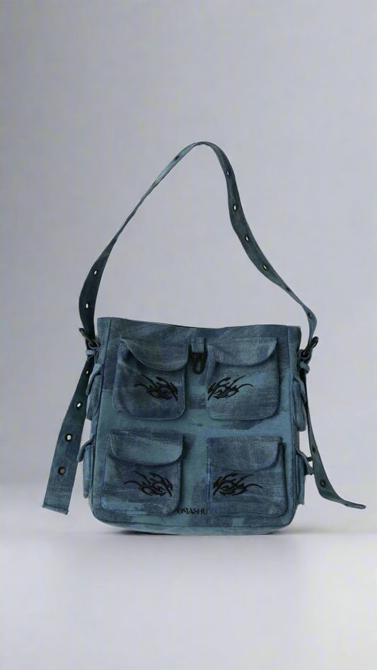 Keychain Cargo Bag XL - Ocean with tribal embroidery and multiple pockets, displayed on a plain background.