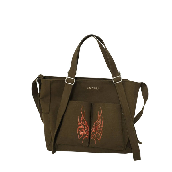 Brown bag with red dragon design on a white background