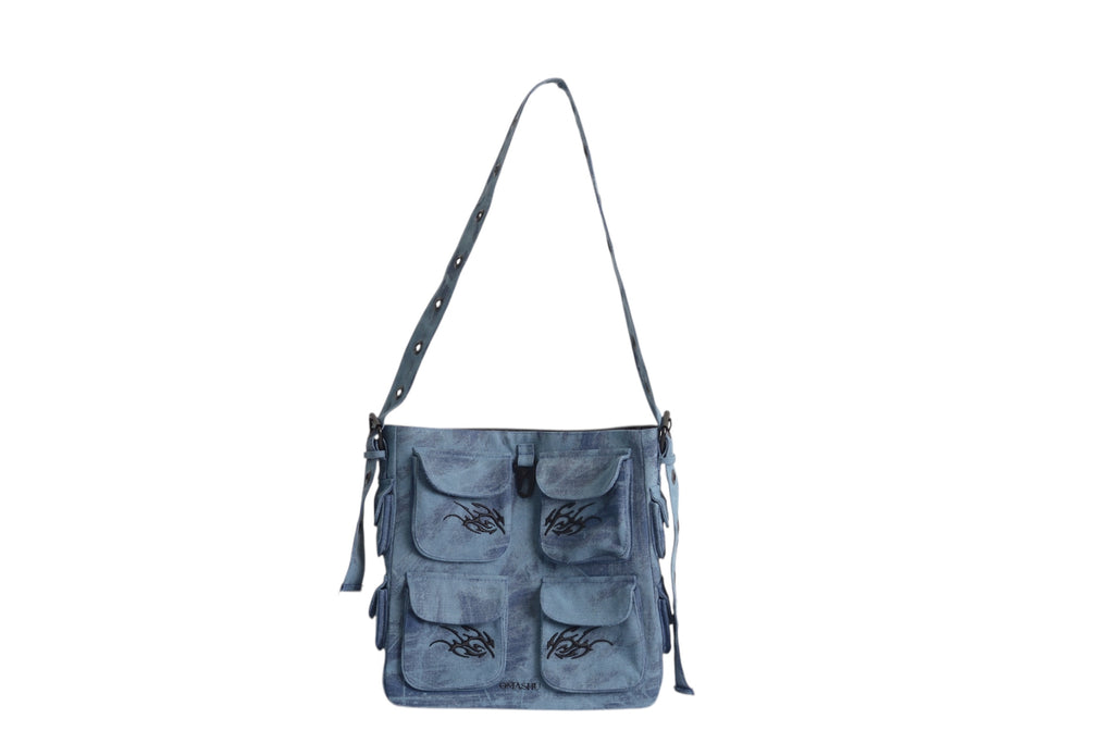 Keychain Cargo Bag XL - Ocean with tribal embroidery and multiple pockets, displayed on a plain background.