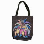A photo of a tote bag with a colorful design of a group of people with their arms stretched out in different directions, wearing colorful clothes and with different skin tones, against a dark brown background with vertical lines, with a green handle.