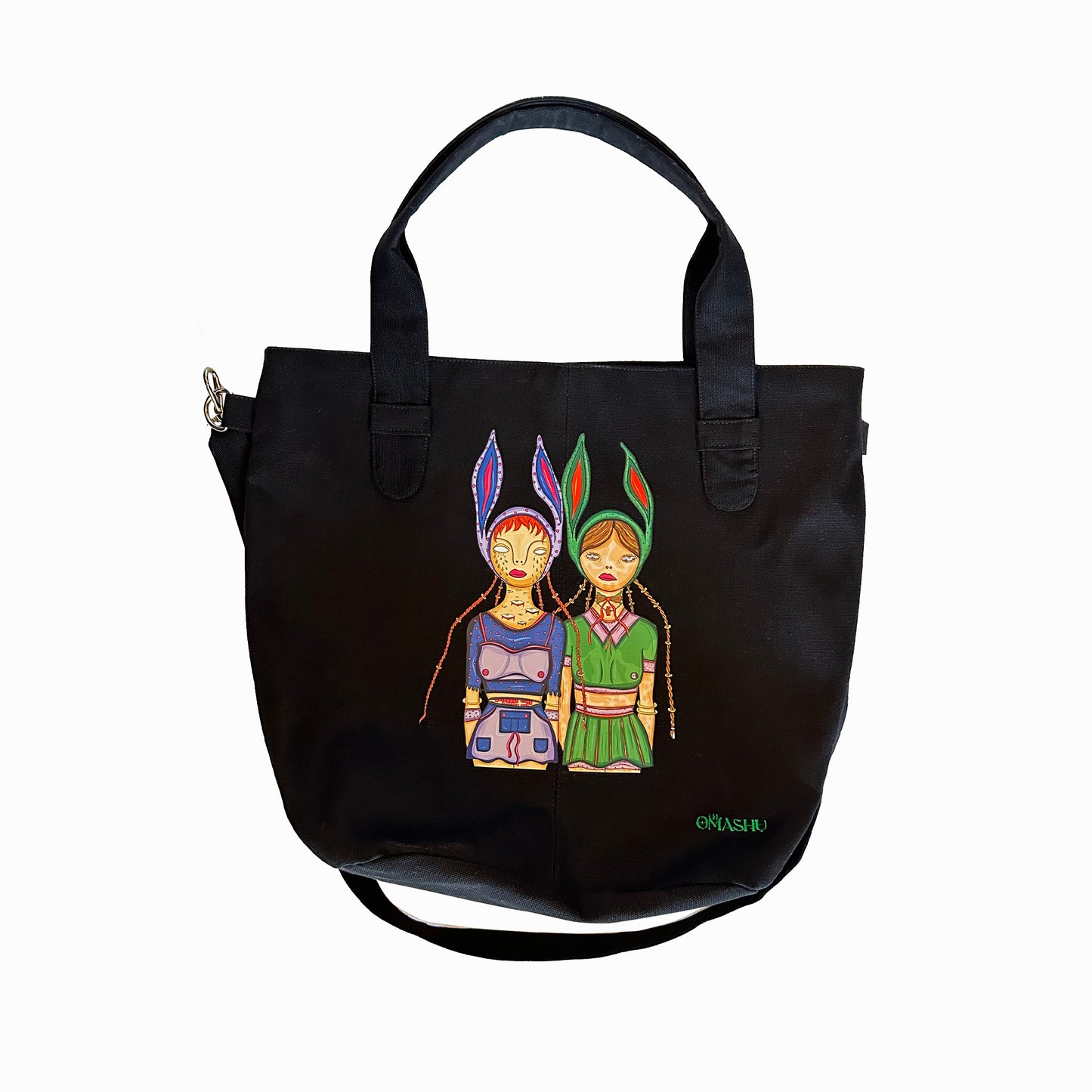 Omashu bag with small and large handle and has illustration of 2 girls one in pink and one in blue