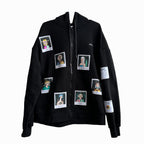 Black hoodie with multiple patches on it. The patches are of different sizes and shapes and are scattered all over the hoodie. The patches are of different colors and have different designs on them. Some of the patches have text on them, such as ‘WRATH’, ‘ENVY’, and ‘SLOTH’